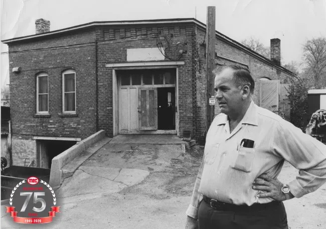 Ted by building with 75th Logo